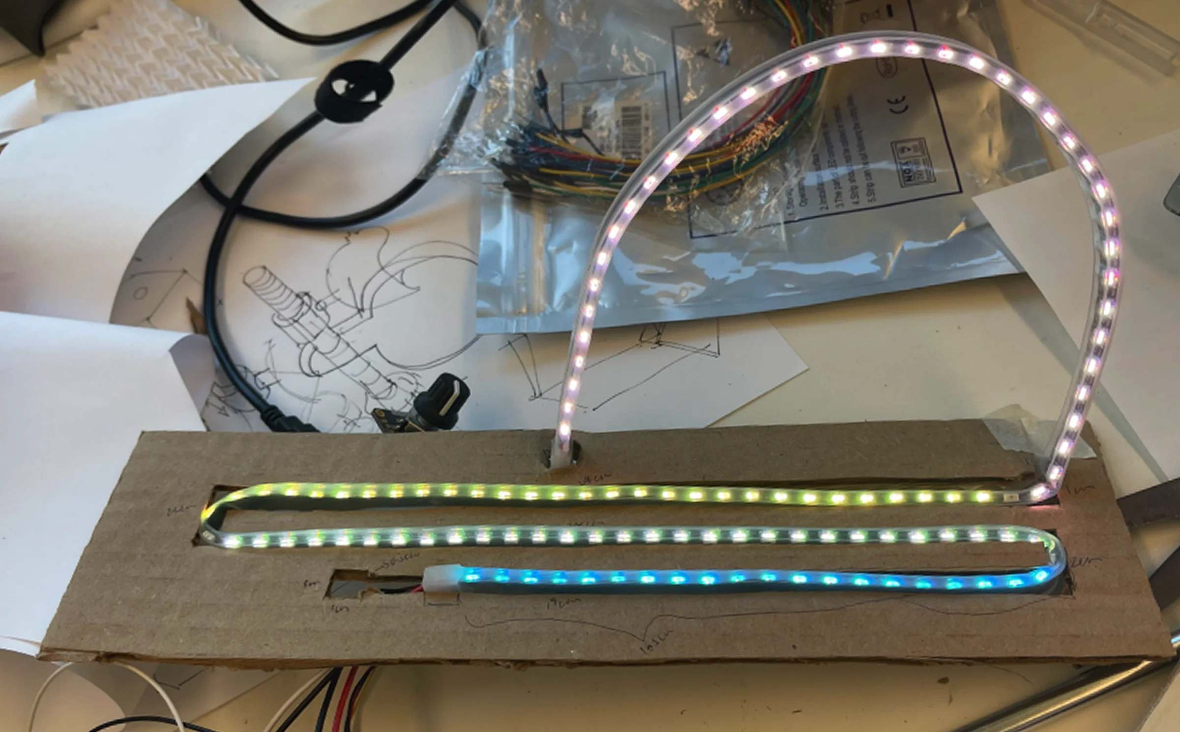 LED sequence testing — layer-by-layer color behavior on flat cardboard