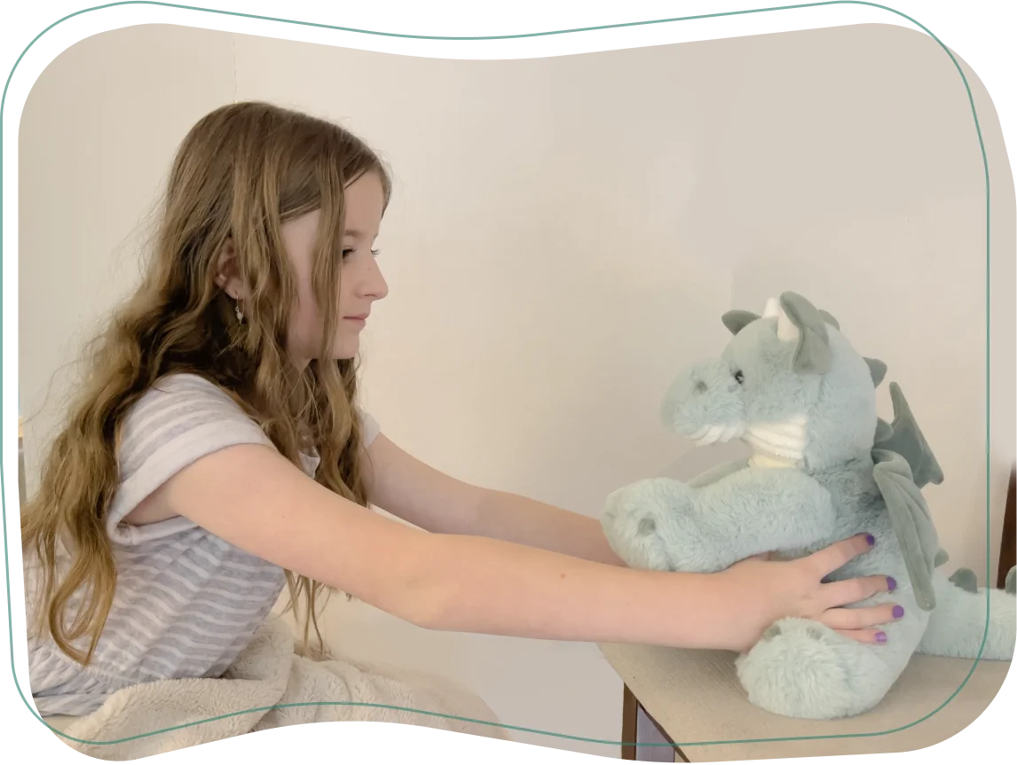 The egg hatches to reveal a stuffed dragon that the child can hold during the rest of the procedure.